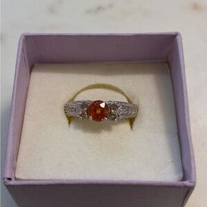 Spessartite Garnet Ring with white sapphire accents